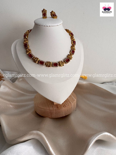 Laxmi Motif Choker with Pink Stone – Matte Gold Finish
