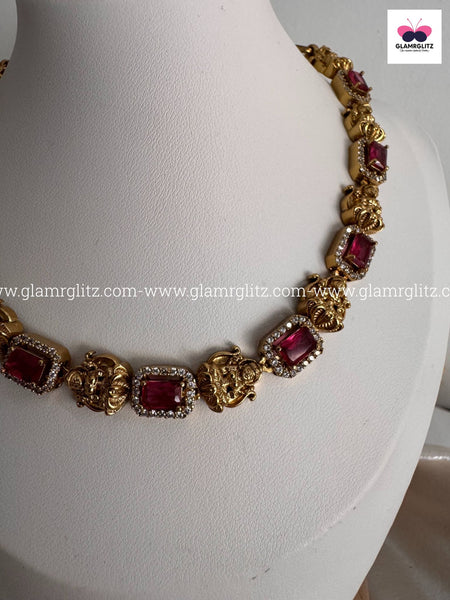 Laxmi Motif Choker with Pink Stone – Matte Gold Finish